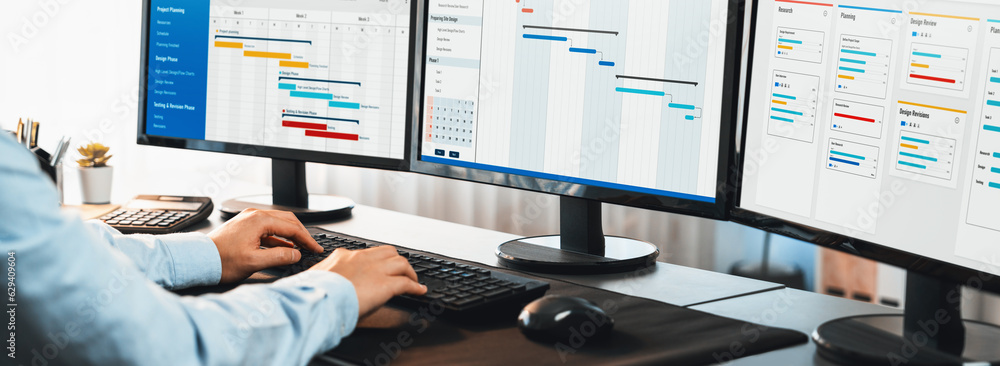 Aufkleber project manager planning schedules for business task on office using gantt chart software display on