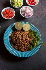 View from above of gram sprout salad served in a bowl. Selective focus.