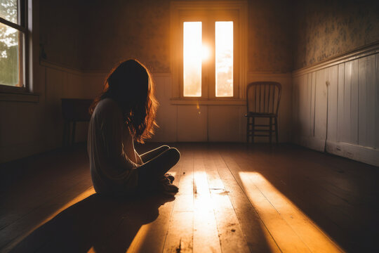 Unhappy lonely depressed woman at home, she is sitting in empty room sunset, depression concept generative ai