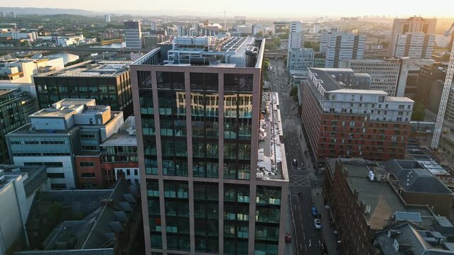A 180-degree pan at sunset of Glasgow's new office building located on Argyle Street, near Glasgow Central Station.