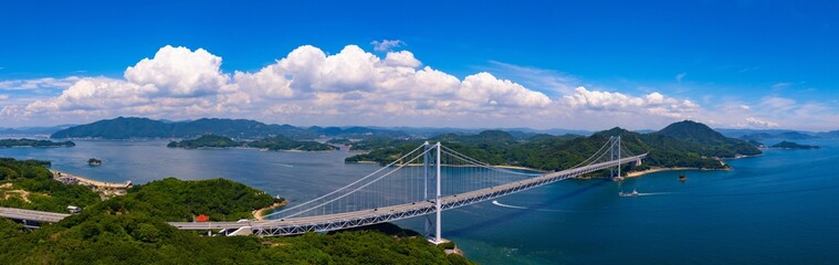 夏の因島大橋と瀬戸内海の風景　ドローン撮影 - obrazy, fototapety, plakaty