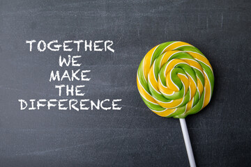 Together we make the difference. Text on a dark chalkboard background