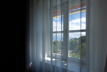 Fototapeta na wymiar Window shutters and curtains at seaside apartment, selective focus