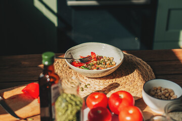 Woman holding plate with vegan or vegetarian food. Healthy plant based diet. Healthy dinner or lunch. Buddha bowl with fresh vegetables. Healthy eating