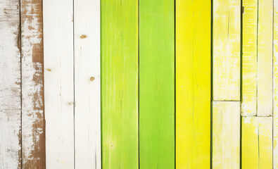 Texture of vintage white, green and yellow wood boards with cracked paint