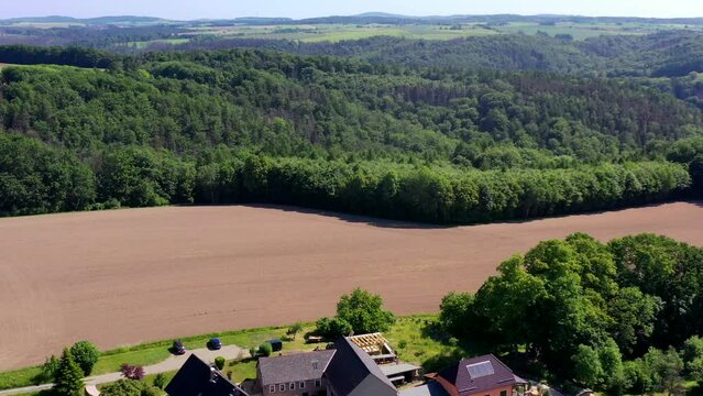 Drone video, flight Over Saxon Switzerland National Park, Hocksteinschaenke. Motorbikes on the road, road junction, Hohnstein, Saxony, Germany, Europe