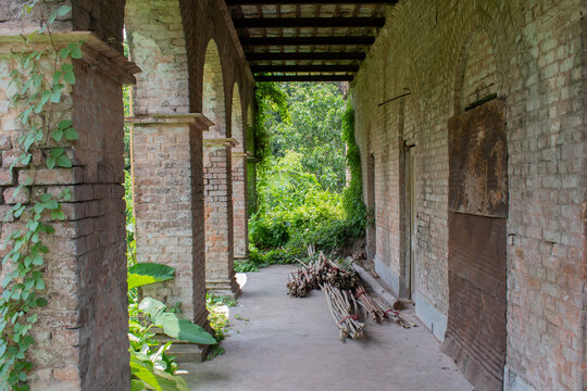 abandoned ancient corridor parts of eastern palace of long gone "zamindar" or landlord of taki, west bengal, india