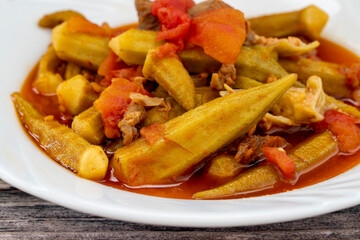 Meat okra dish in a plate.