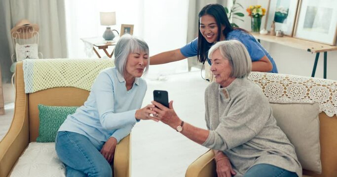 Senior women friends, nurse and selfie for smile, relax or memory in lounge, post or web blog. Elderly Asian lady, group and photography for social media, profile picture or diversity in nursing home