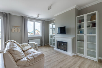 White, modern open space with wooden furniture set