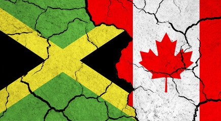 Flags of Jamaica and Canada on cracked surface - politics, relationship concept