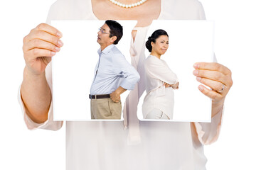 Digital png photo of caucasian woman holding torn photo of asian couple on transparent background