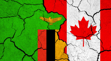 Flags of Zambia and Canada on cracked surface - politics, relationship concept