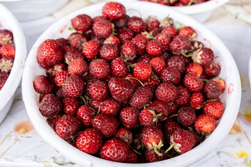 baby strawberries fruit in a box