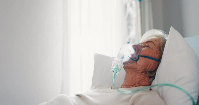 Hospital, oxygen mask and senior woman in bed for recovery, rest and rehabilitation for surgery. Healthcare, clinic and elderly female person with ventilation for medical care, service and breathing