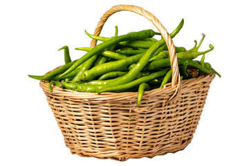 Fresh green pepper in a wicker basket isolated on white background. Green chili pepper harvest season concept. Vegetables for a healthy diet