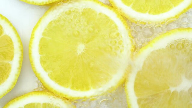 Fresh yellow lemon and soda.