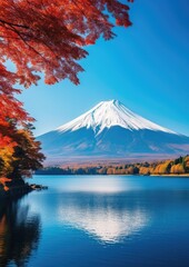 Fototapeta premium Vulcano mountain with a colorful tree in the foreground and beautiful clear mountain lake, Japan nature.
