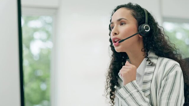 Headset, talking and a woman in a call center for customer service, telemarketing and crm. Female consultant or agent at a computer with account information for technical support, sales or help desk