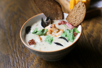 Warming seafood soup with cream
