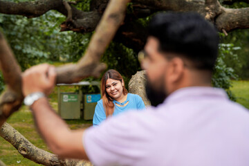 Young indian couple enjoying and spending quality time at park.