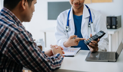 Obraz premium medical doctor holing patient's hands and comforting her.Kind doctor giving real support for patient. In clinic