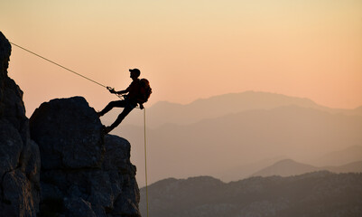 Obraz premium Young Athlete's Challenging Rock Climbing 