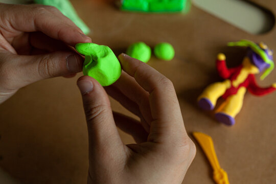 Hands sculpt children's air plasticine