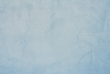 Decorative light blue painted wall background. Beautiful abstract stucco texture,wall decor for...