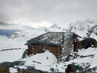 Cabin in the mountains with snow
