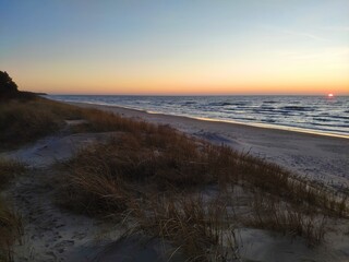 Beach with sand sea and blue sky shore
