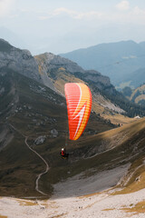 paragliding in the mountains - obrazy, fototapety, plakaty