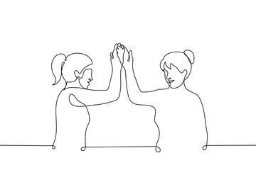 women stands giving each other five smiling - one line drawing vector. the concept of female solidarity, female friendship and teamwork