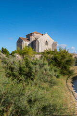 Fototapeta na wymiar Talmont sur gironde, View of the church Sainte Radegonde 12th century. High quality photo