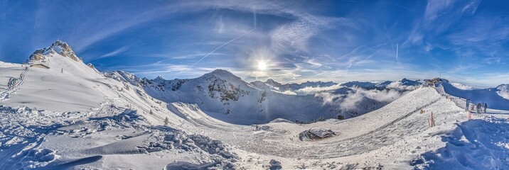 Panoramic image of a ski slope in Kanzelwand ski resort in Kleinwalsertal valley in Austria