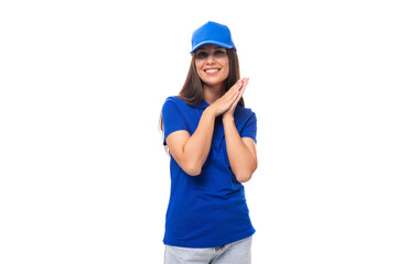 pretty friendly young woman in blue cotton t-shirt and cap with merch perspective