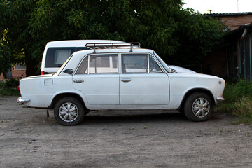 Obraz na płótnie Canvas Old soviet white car. Old car
