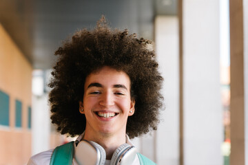 Portrait of a smiling teenager girl with afro hair