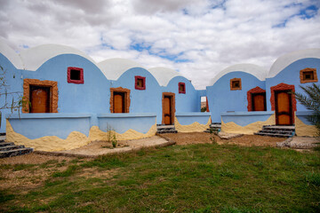 Fototapeta na wymiar Eco hotel blue small houses in Egypt 