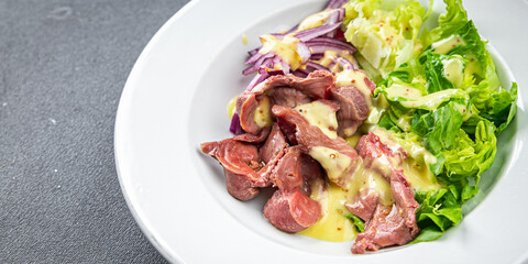 chicken stomach salad green lettuce, onion, salad dressing vegetable food healthy meal food snack on the table copy space food background rustic top view keto or paleo diet
