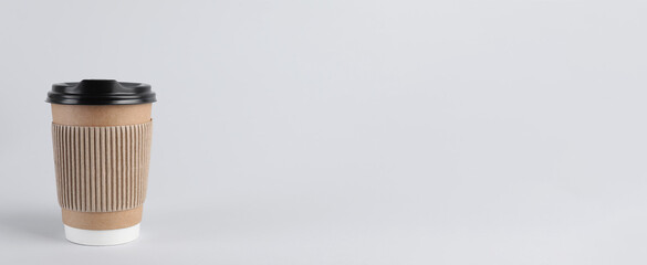 To-go drink. Paper coffee cup on white background, space for text. Banner design