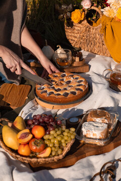A festive autumn brunch among the yellow trees, with pumpkins, a cofee and cake. Thanksgiving or family dinner in the backyard. Nodody. Banner