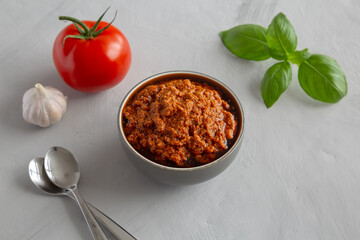 Homemade Sun Dried Tomato Pesto in a Bowl, side view.