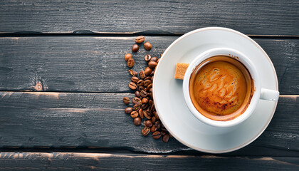 Espresso coffee On a wooden background. Top view. Free space for your text.