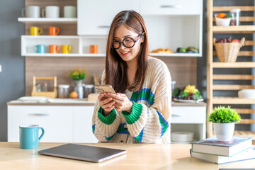 Woman use smartphone playing, shopping, social media communication and digital online, work, online social media, online marketing, technology, chat, post, like, follow on phone screen at home