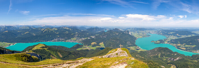 view from the top of Mount Schafberg over the landscape with mountains and Lake Mondsee and Wolfgangsee, Alps, Austria