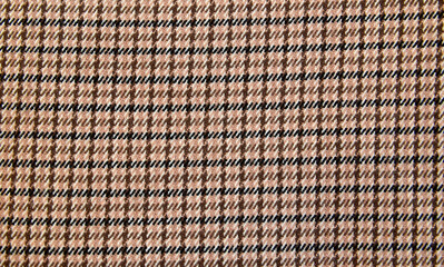 Сotton сheck fabric texture.Seamless textile design for clothes,tartan tweed,scottish cage.Selective focus.