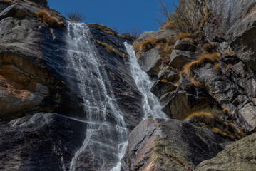 Waterfall in the nature of Macugnaga in Italy alps