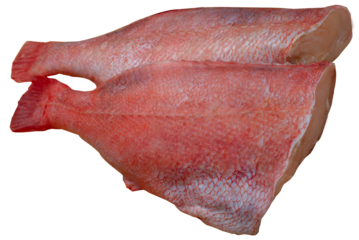 Two butchered pink snappers. Laid out fishes at the fish market