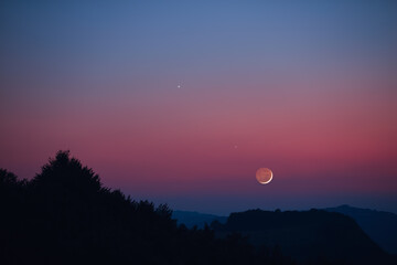 Crescent Moon, planet conjunction and landscape scenery silhouettes. - obrazy, fototapety, plakaty